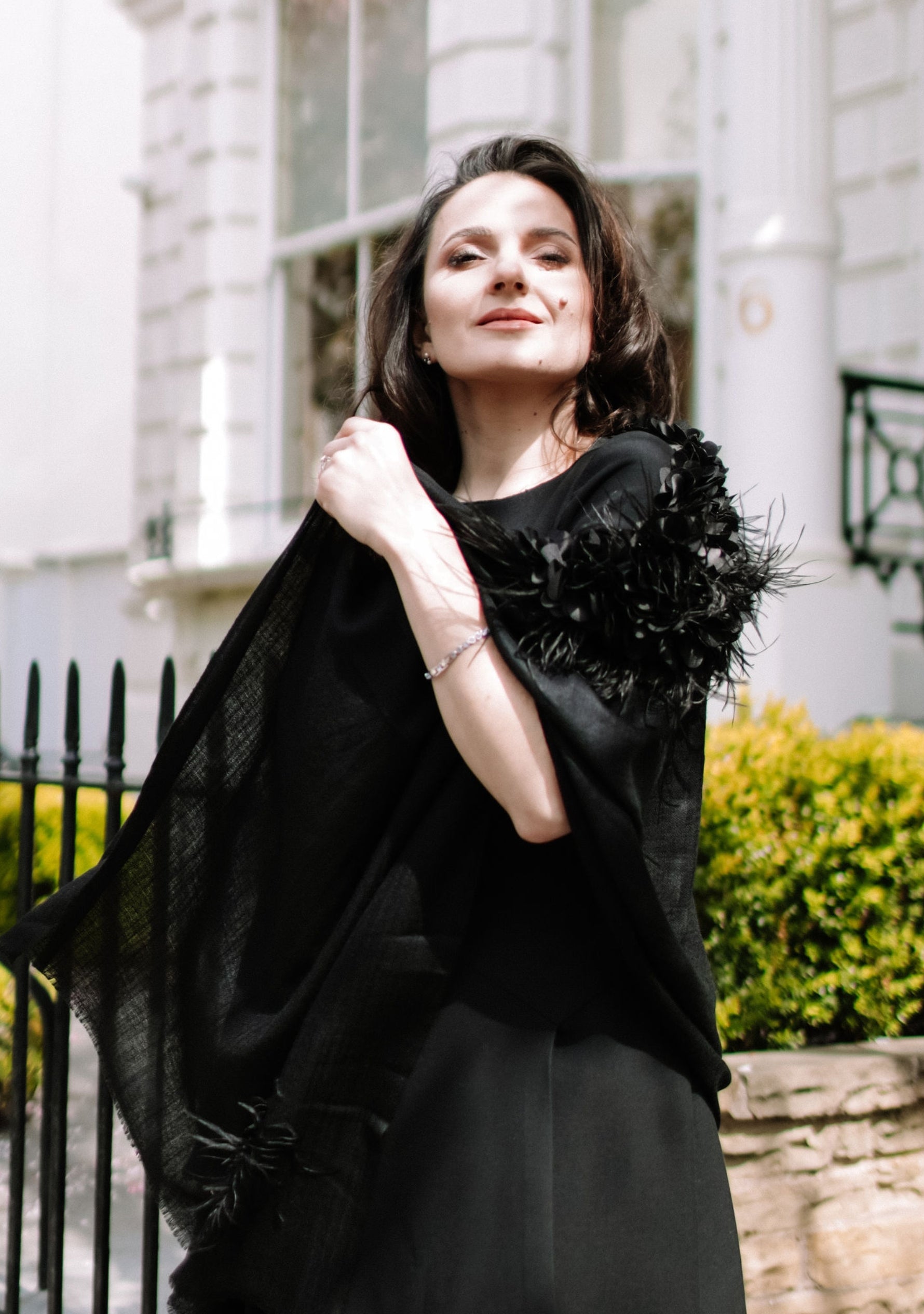 Black Cashmere Scarf
Black Feather & Satin Appliqués