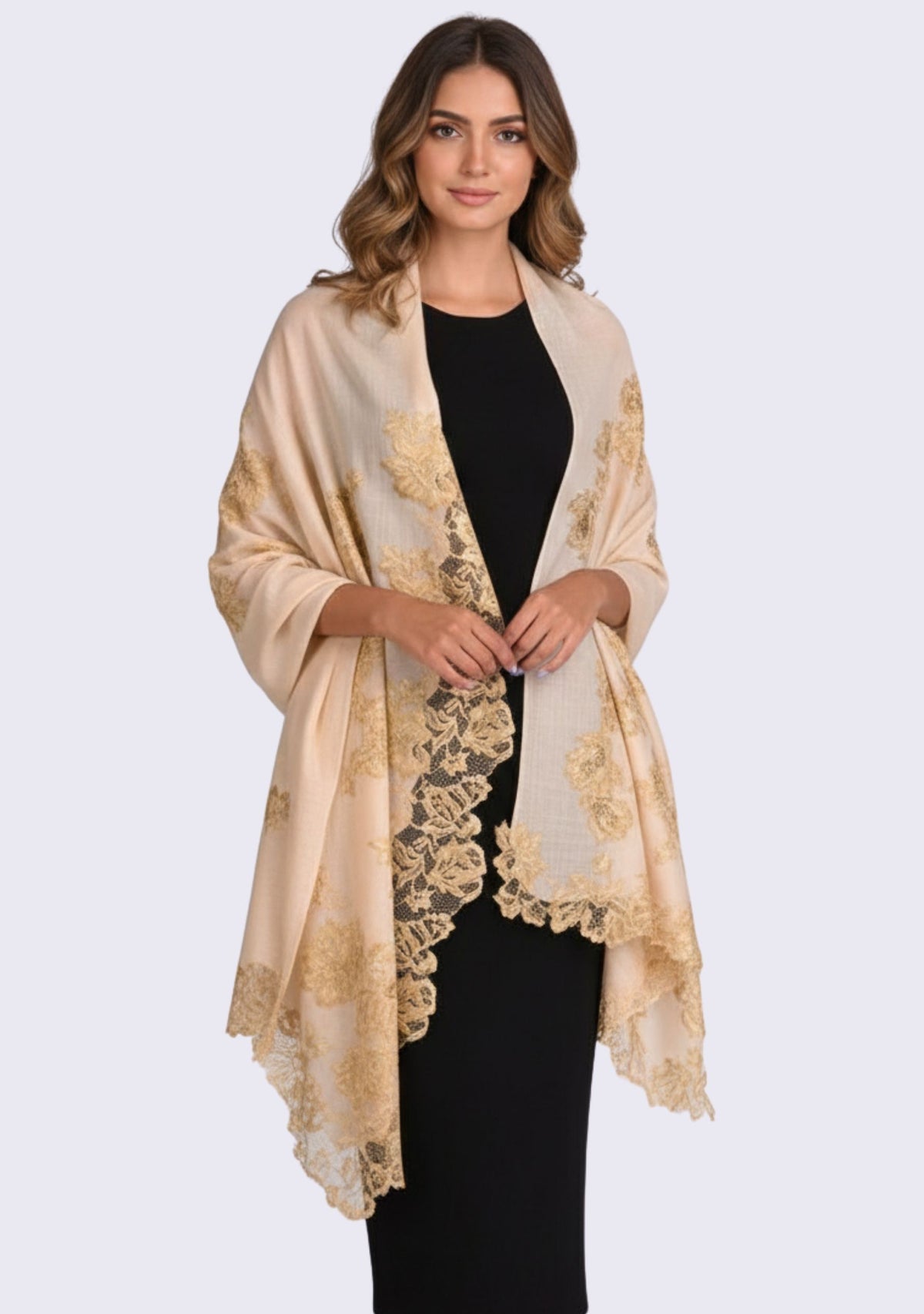 Female model wearing a luxury beige cashmere scarf with handcrafted gold Chantilly lace, elegantly styled as a formal wrap for weddings, evening wear, and special occasions.