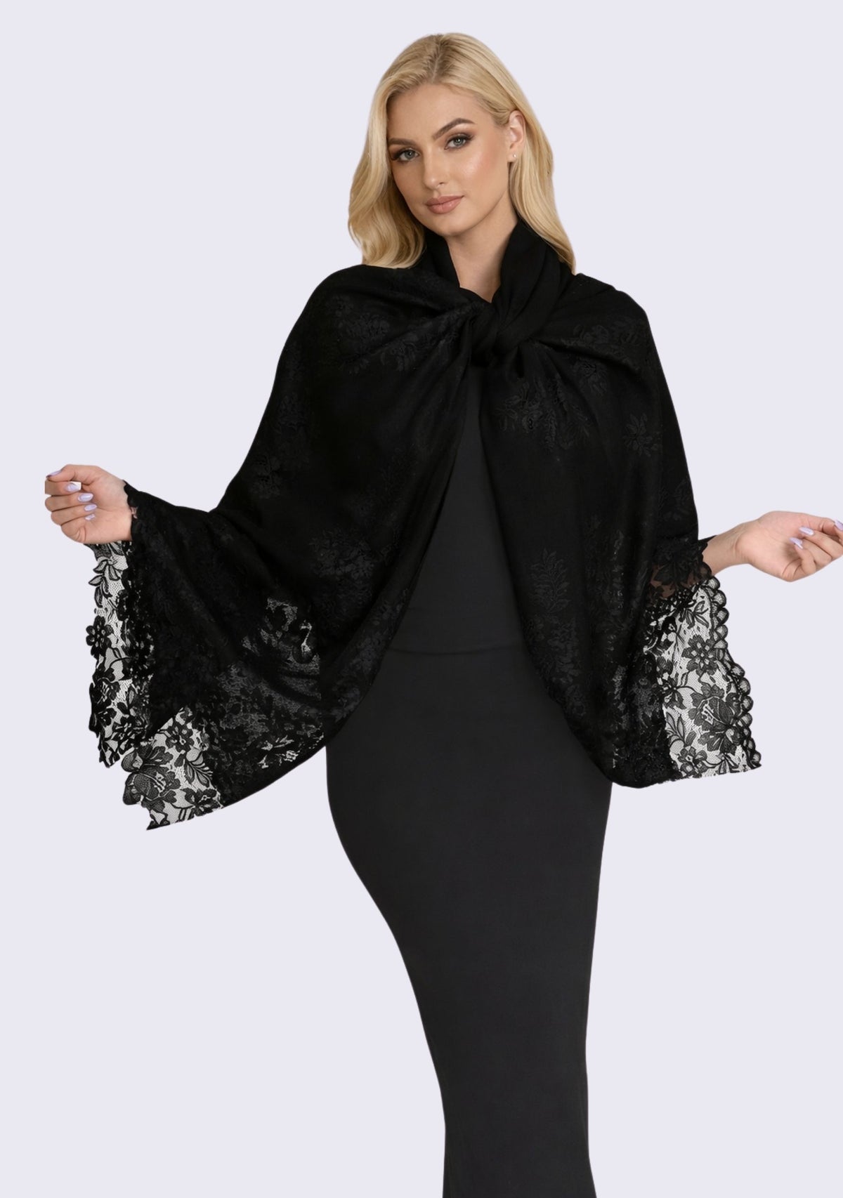 Female model wearing a black cashmere scarf with elegant black Chantilly lace, styled as a sophisticated wrap for evening wear and formal occasions.