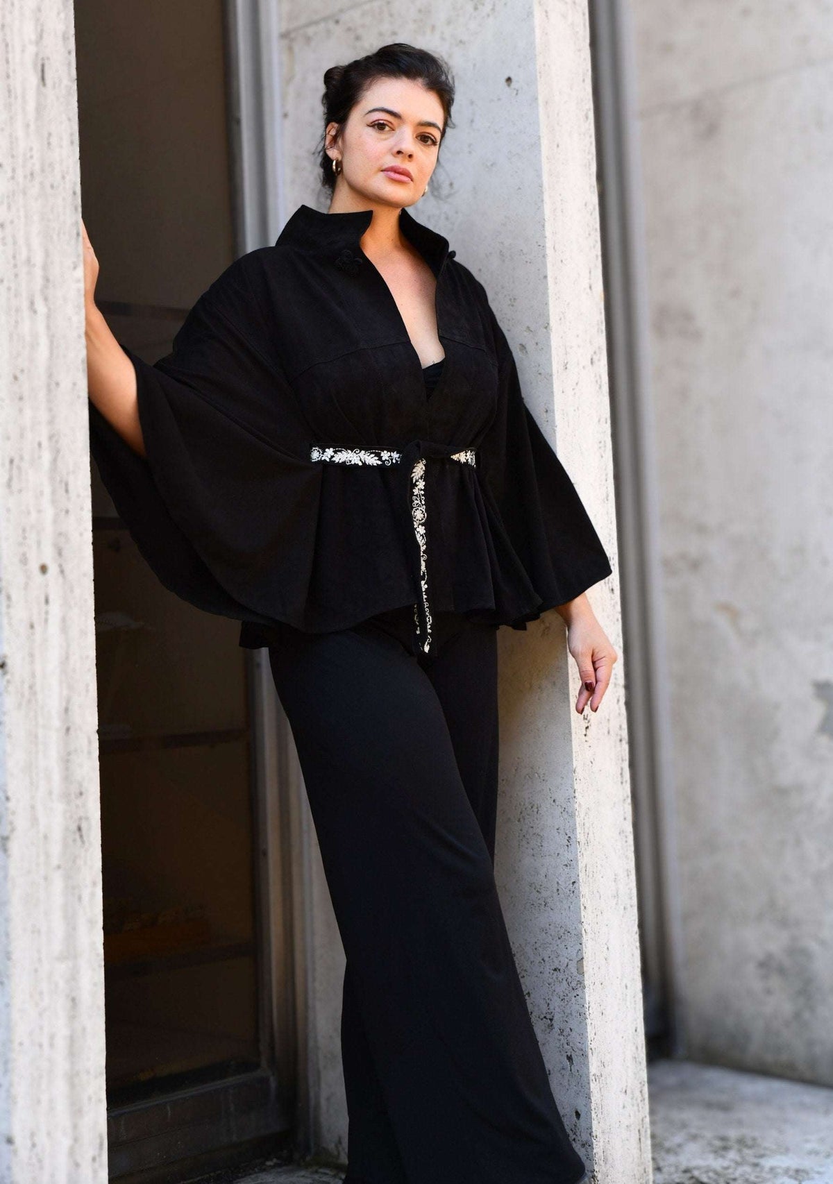 Maneesha Ruia black suede leather jacket with ivory embroidered belt, luxury designer outerwear for women