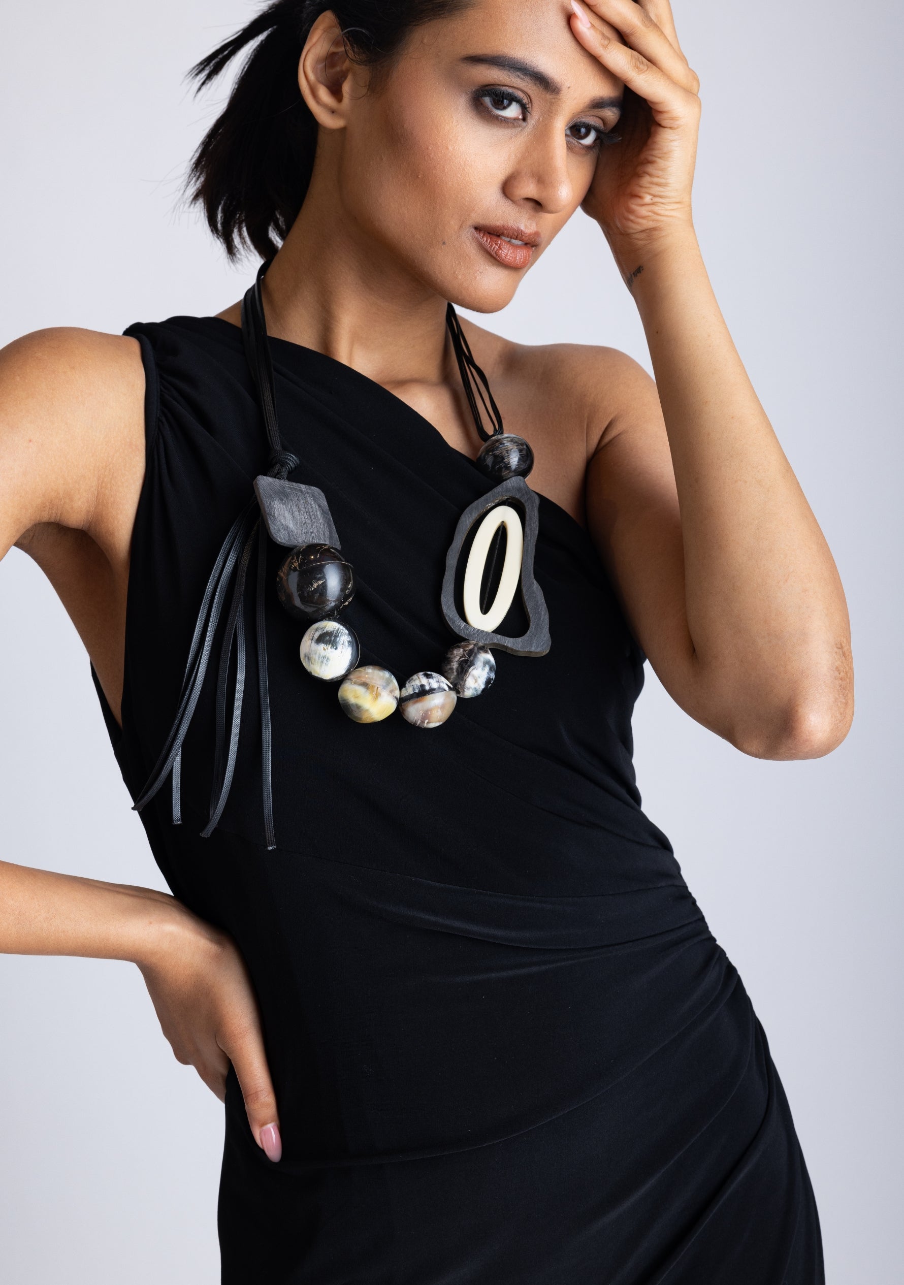 Black Cord Necklace with Black-Natural Buffalo Horn Balls and a White Resin "0"