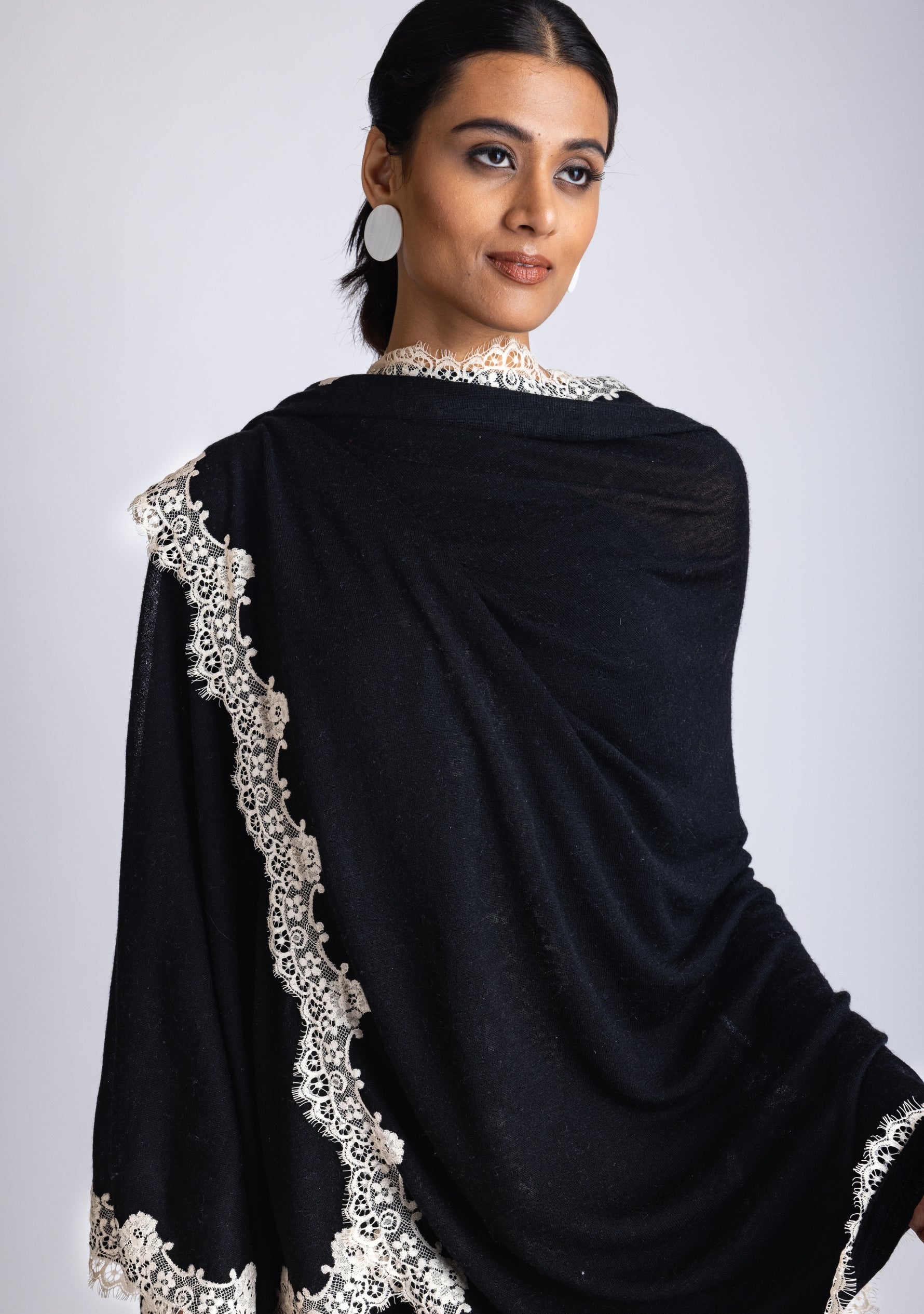 Black Knitted Merino Wool Cape with a Scalloped Beige Filigree Lace Border