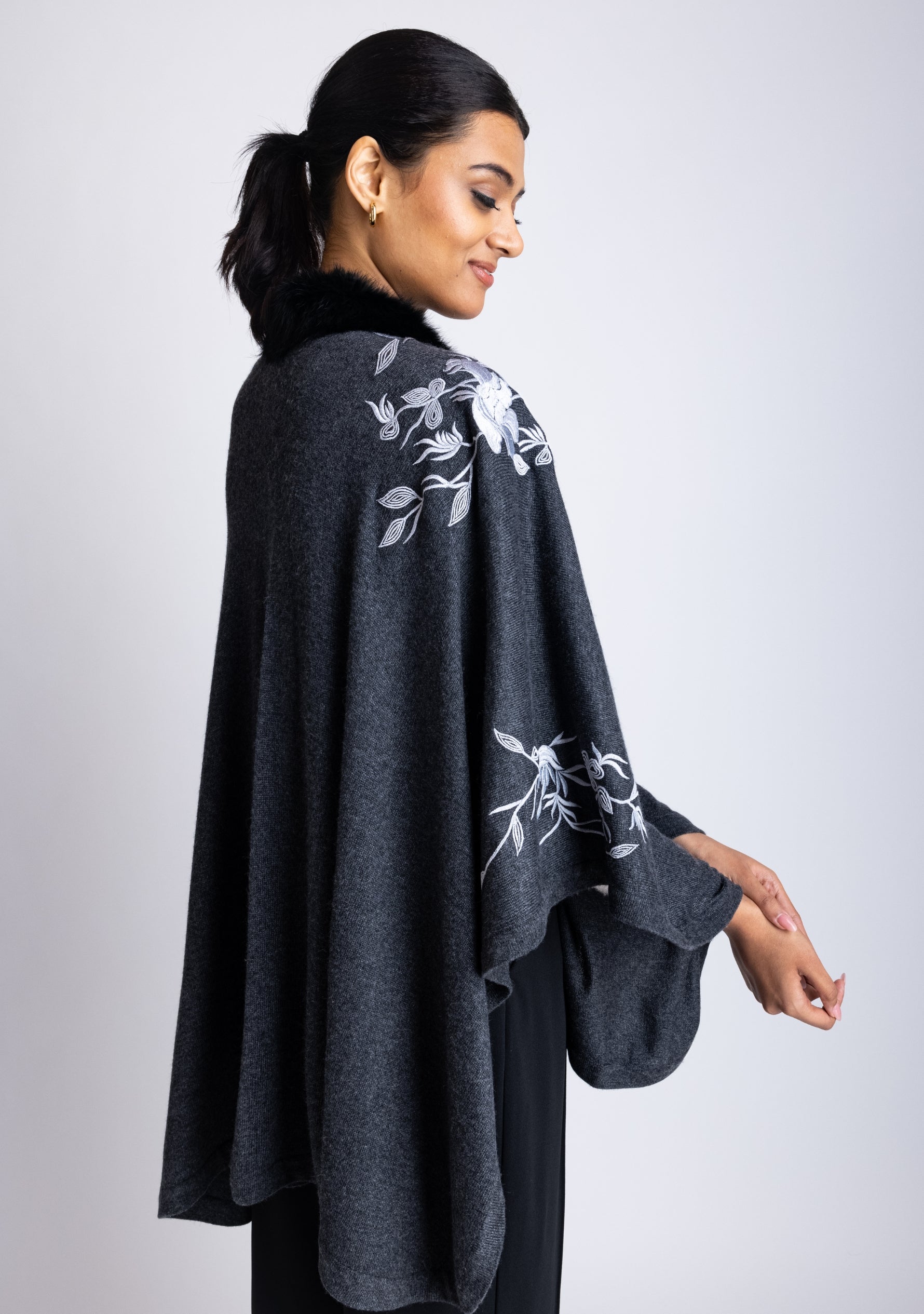 Charcoal Melange Knitted Fine Wool Cape with Lt. Grey Flower Embroidery & a Black Fur Collar