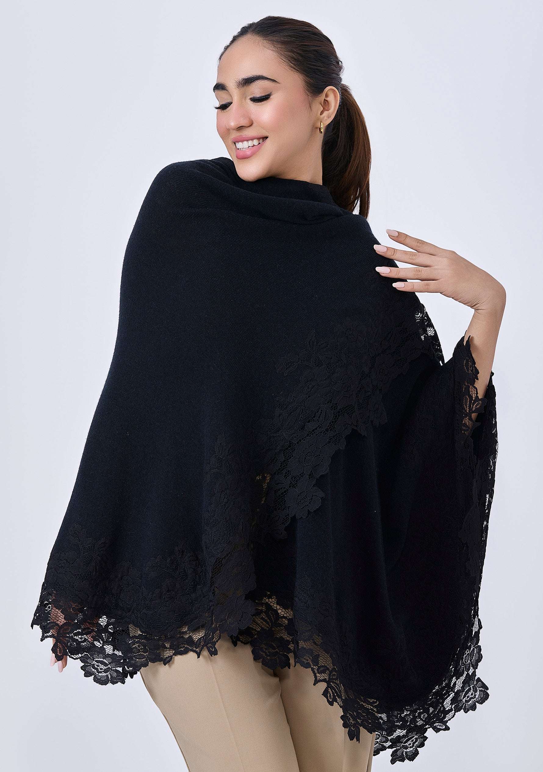 Maneesha Ruia Black Knitted Fine Wool Cape — tonal black floral lace border on soft fine wool