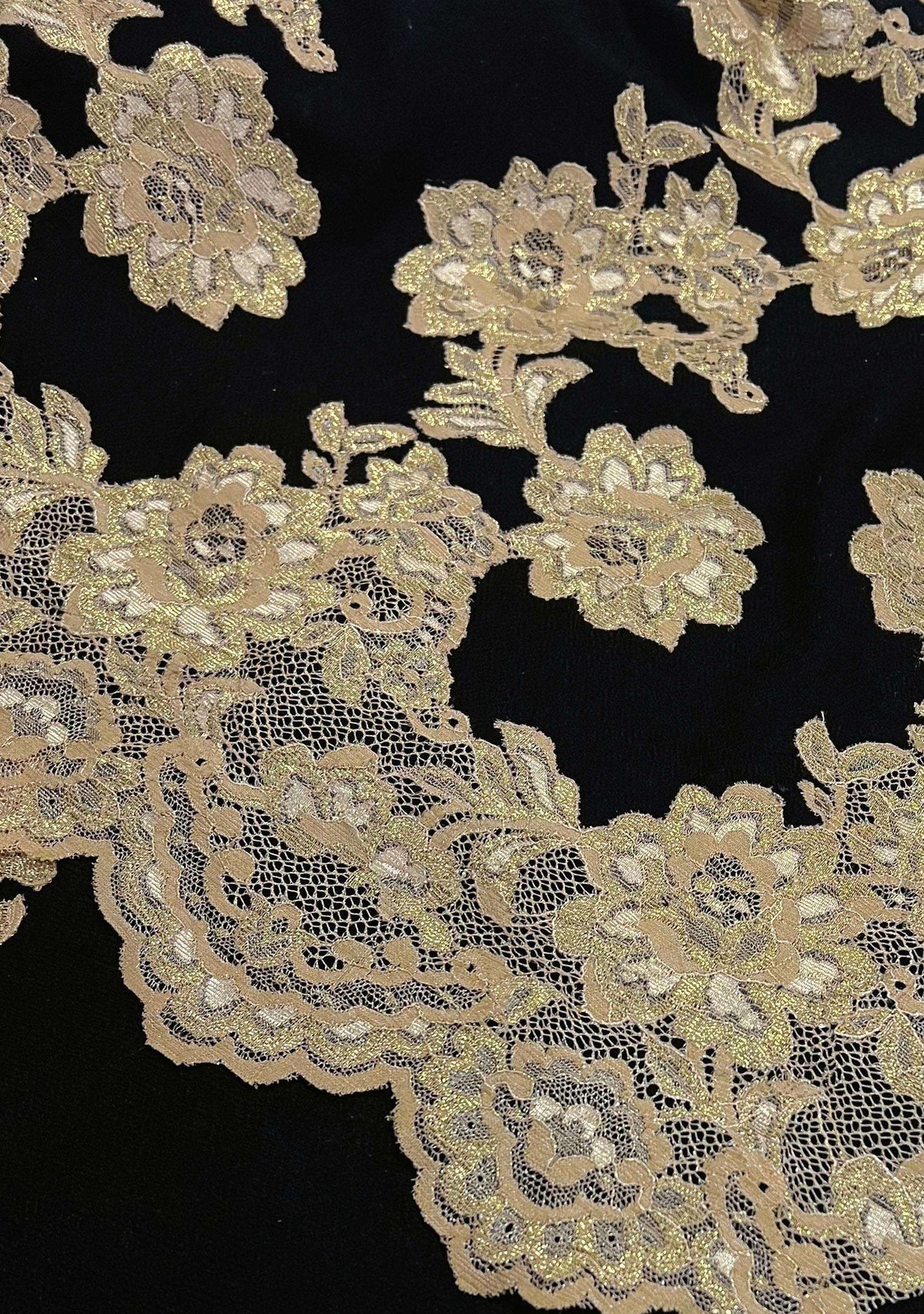 Luxury black cashmere scarf with handcrafted gold Chantilly lace in a floral vine pattern, perfect for formal occasions and timeless luxury styling.
