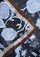 Close-up of the Maneesha Ruia Blue & Brown Jacobean Print Silk Twill Square Scarf with Silver & Gunmetal Swarovski Crystals, showcasing the luxurious silk twill fabric, intricate Jacobean floral print, and crystal embellishments.