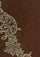 A close-up of a Maneesha Ruia Brown Fine Wool Scarf with gold metallic embroidery and brown fringes