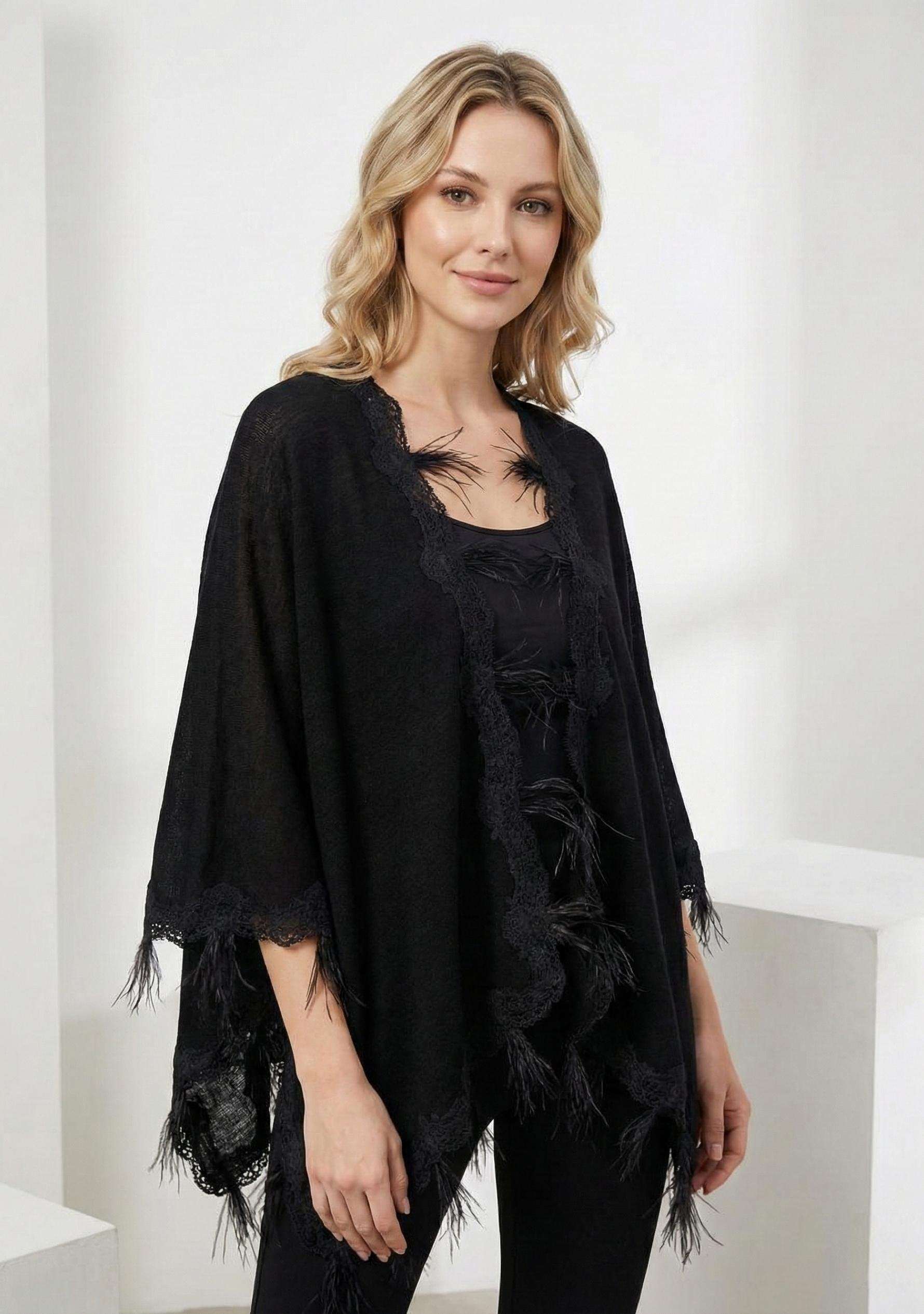 Black knitted merino wool cape with scalloped black lace and ostrich feathers