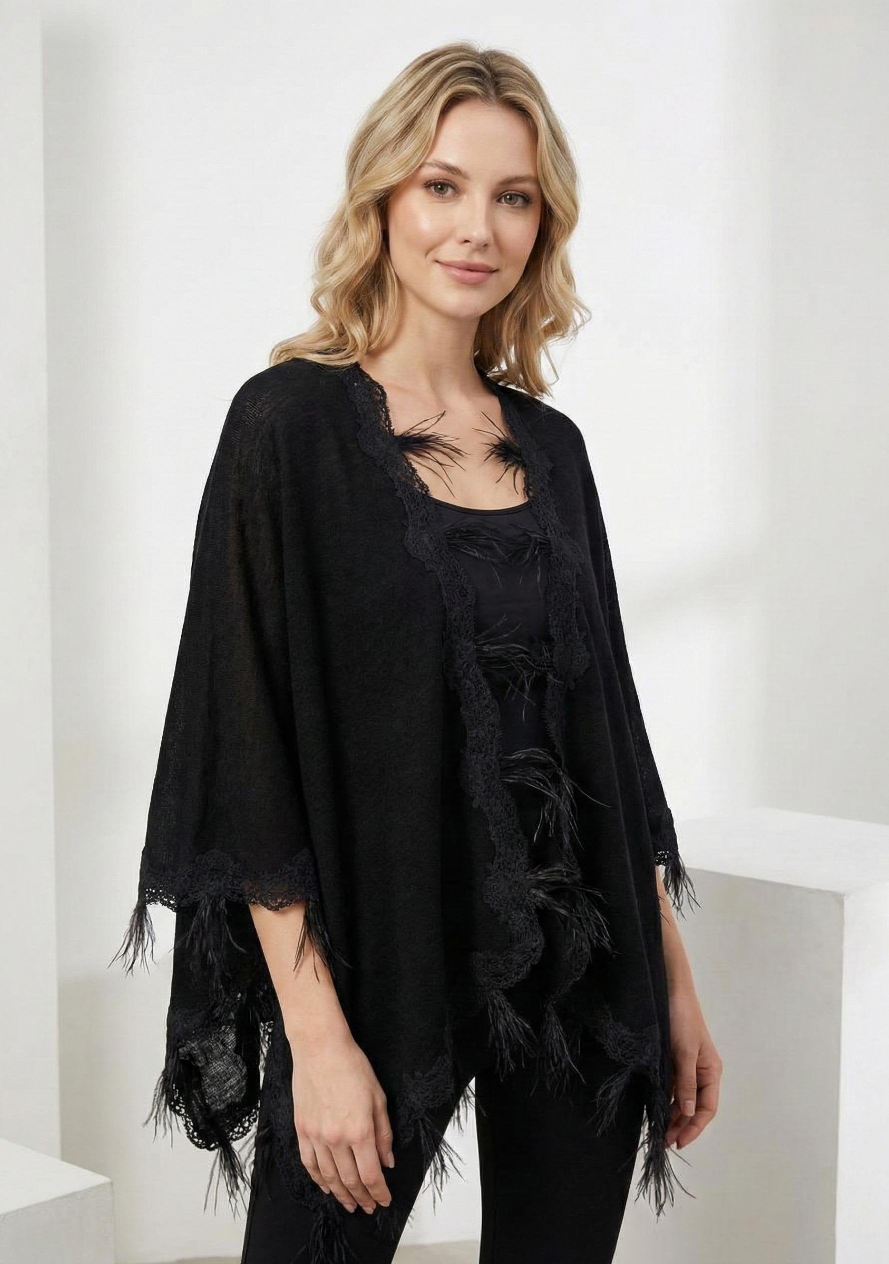 Black knitted merino wool cape with scalloped black lace and ostrich feathers