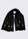 Black scarf with decorative elements on a light gray background
