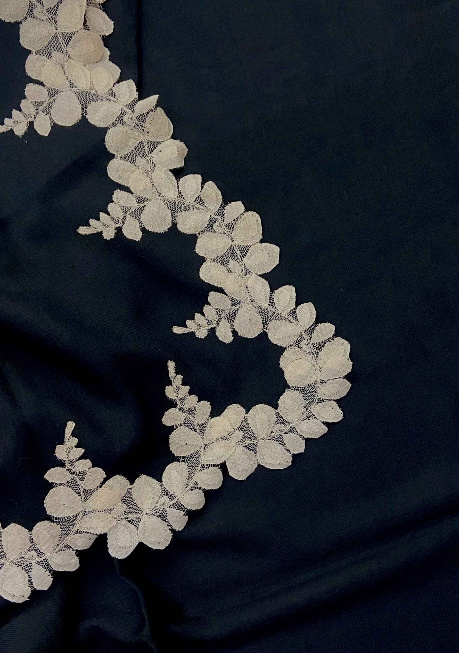 Maneesha Ruia black silk and wool scarf with a beige scalloped grapevine lace