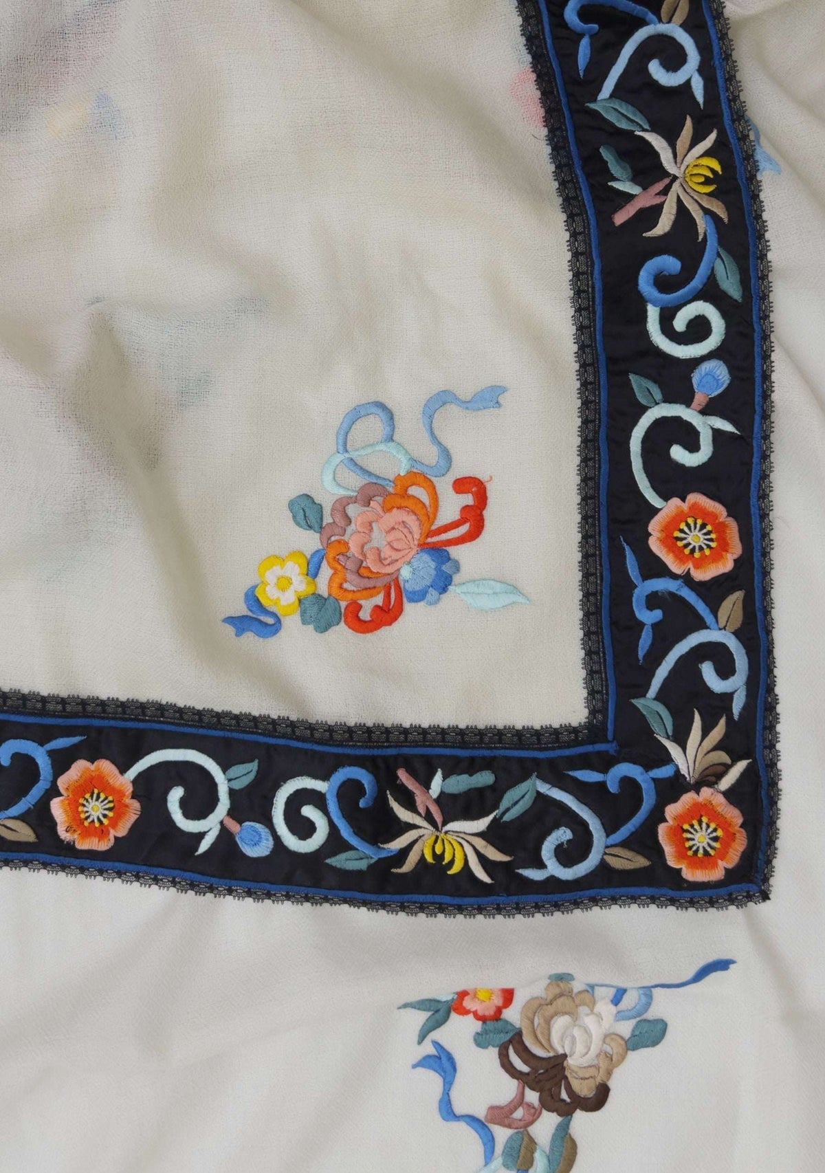 Ivory cashmere scarf with black multi-colored embroidery and black lace