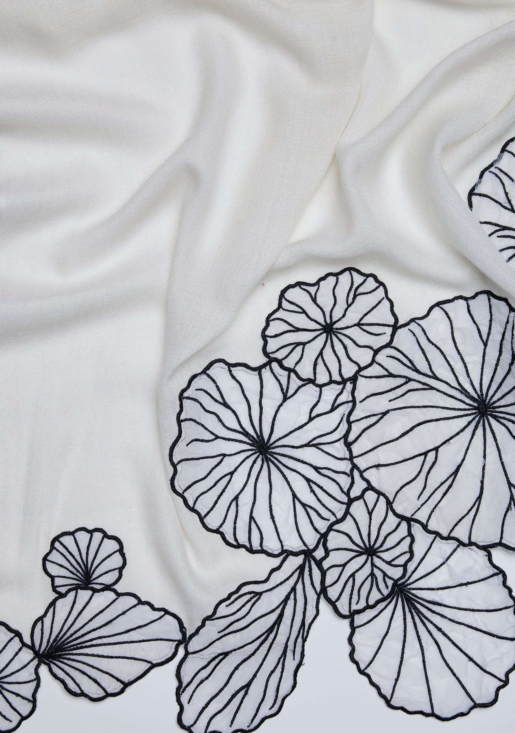 Ivory cashmere scarf with white and black lotus leaf appliques