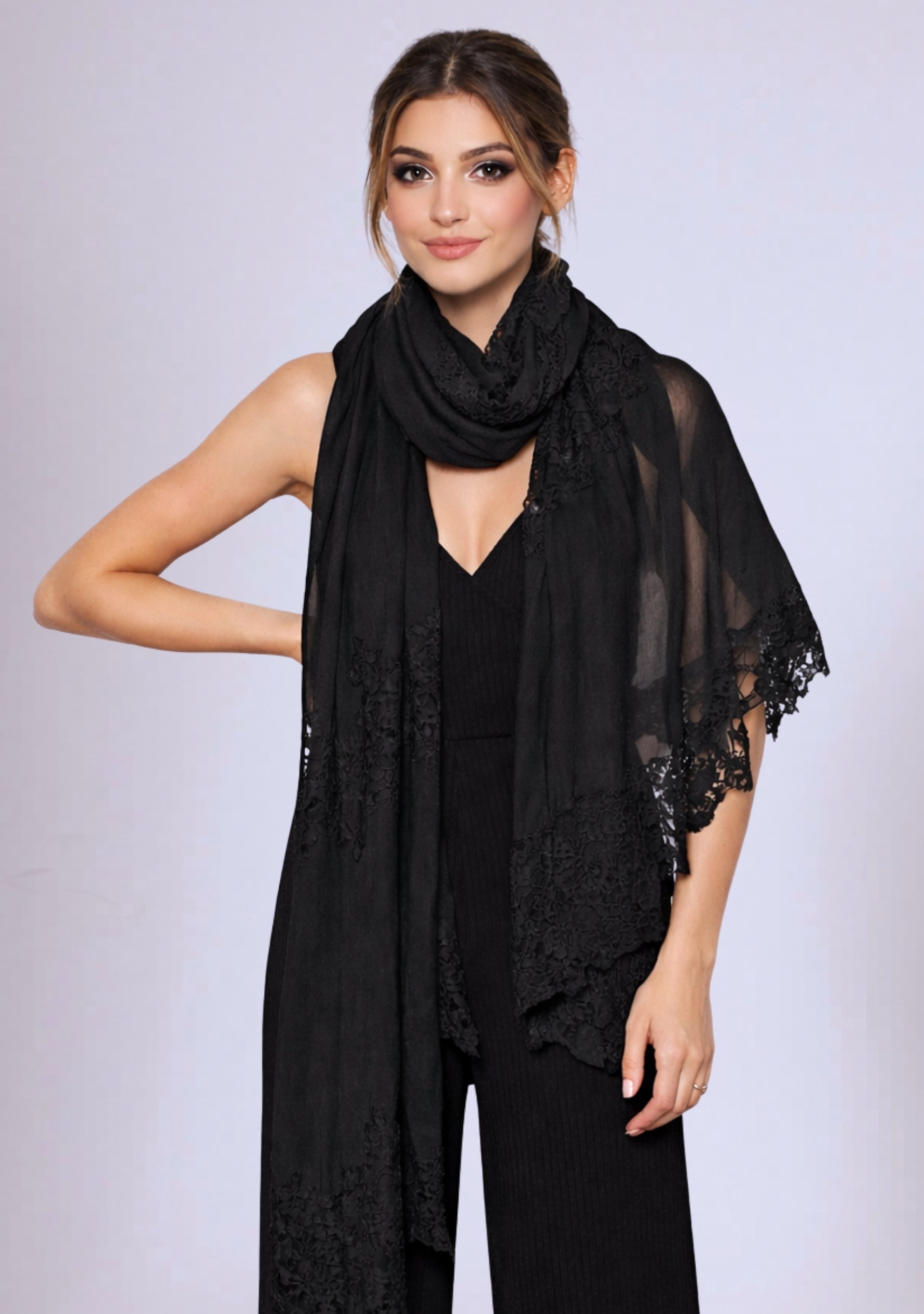 Maneesha Ruia black modal silk scarf with black lace panels styled on female model, luxury designer wrap