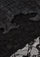 Maneesha Ruia black modal silk scarf with intricate black lace panels, luxury fabric detail