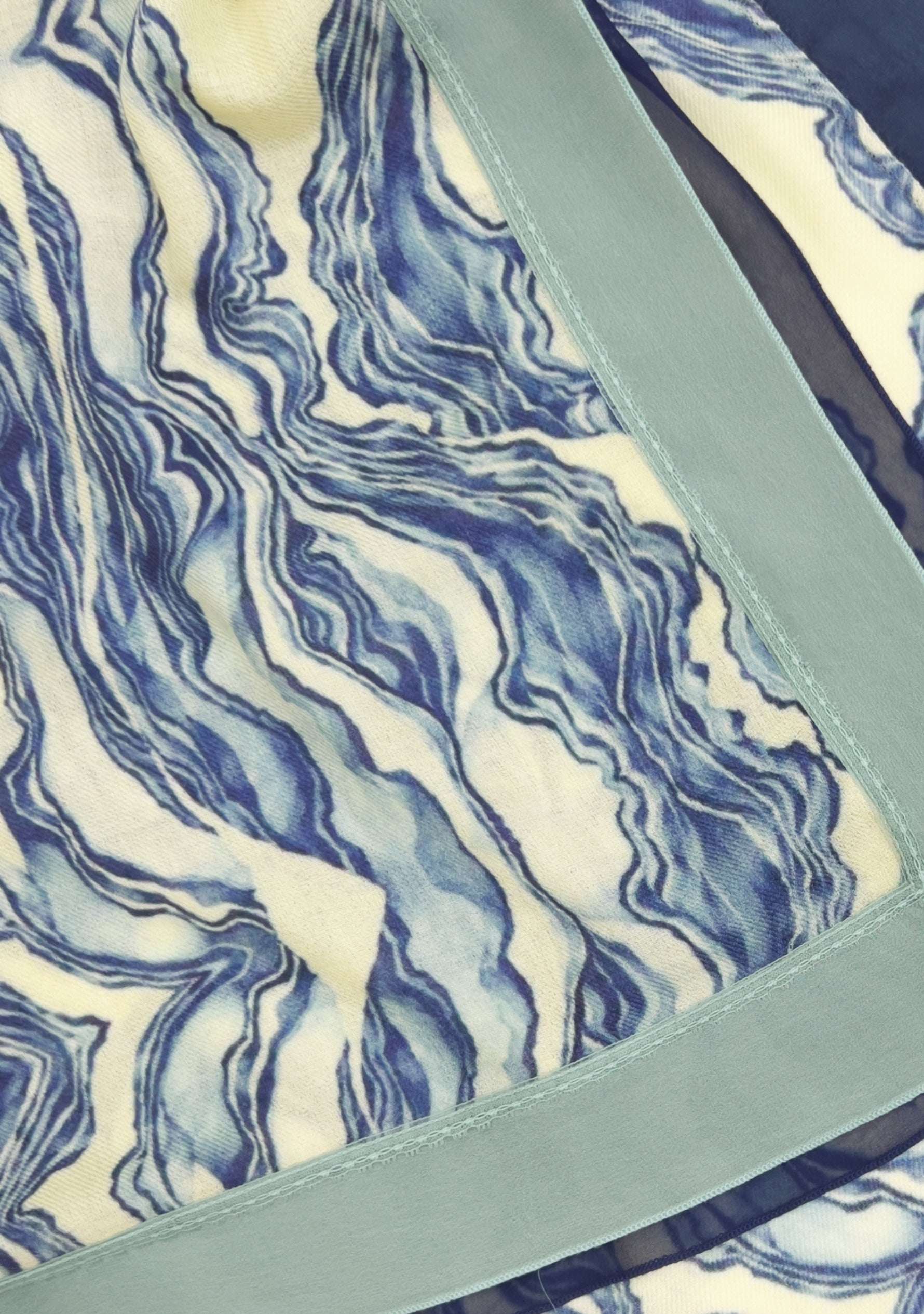 Maneesha Ruia blue abstract print wool and silk scarf with navy blue and sea green lace border, luxury designer scarf