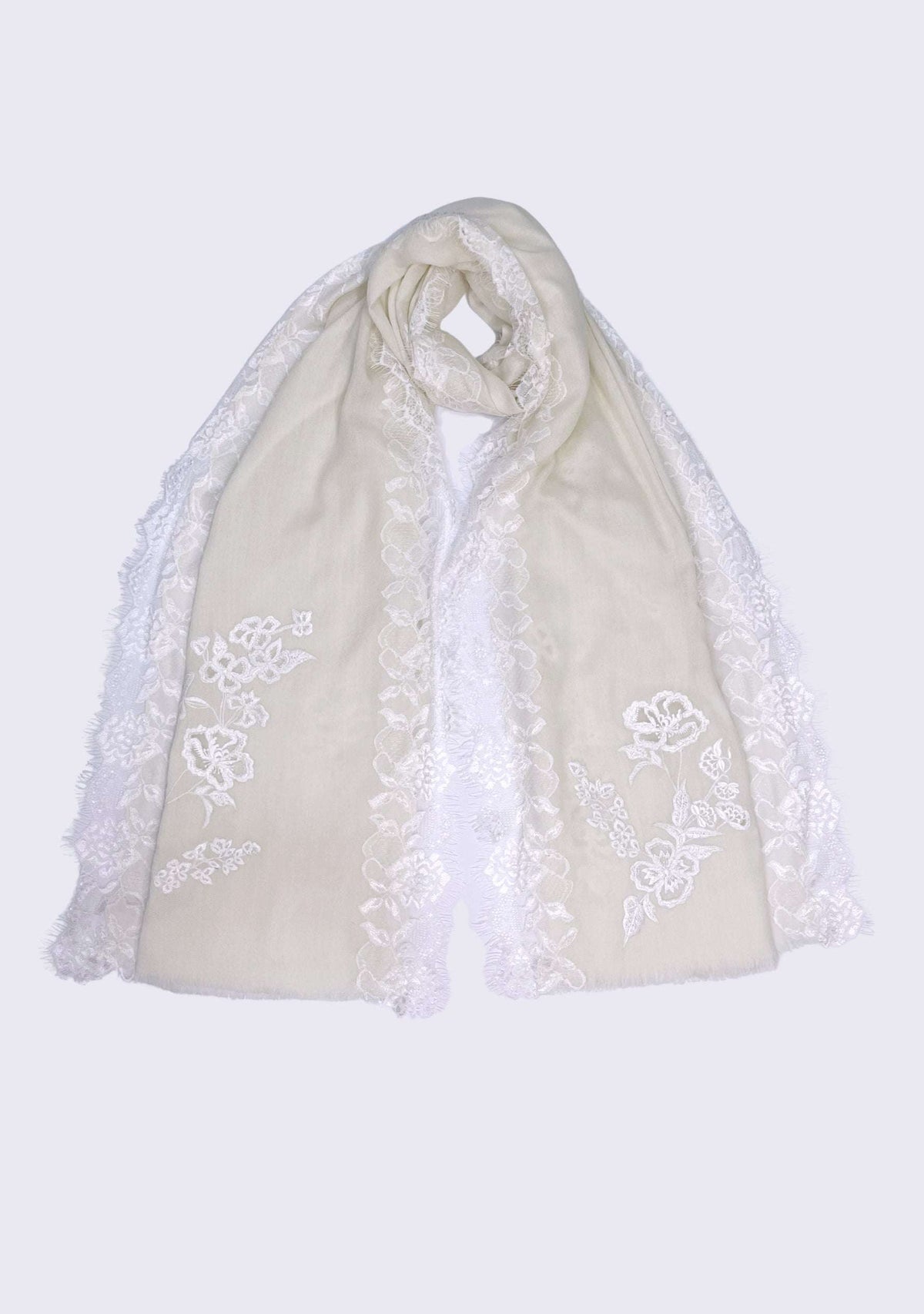 ivory scarf with lace details on a light gray background