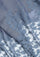 Maneesha Ruia grey lace scarf on an ivory background