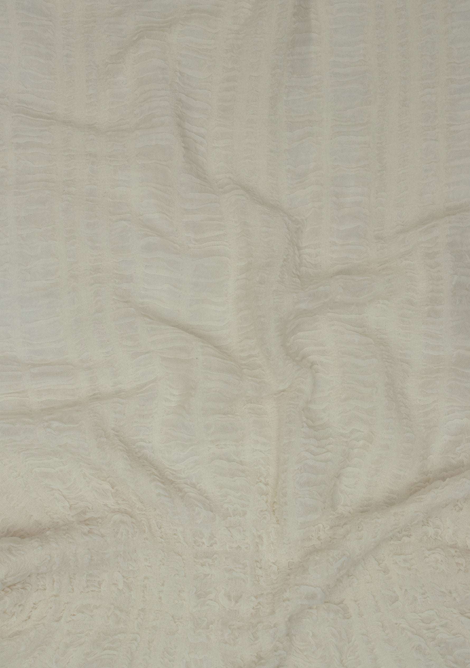 Maneesha Ruia ivory fine wool stretchable crinkle scarf, lightweight luxury designer scarf for women