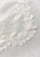 Maneesha Ruia ivory wool and silk scarf with tonal floral lace border, luxury designer scarf close-up detail