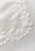 Maneesha Ruia ivory wool and silk scarf with tonal floral lace border, luxury designer scarf close-up detail