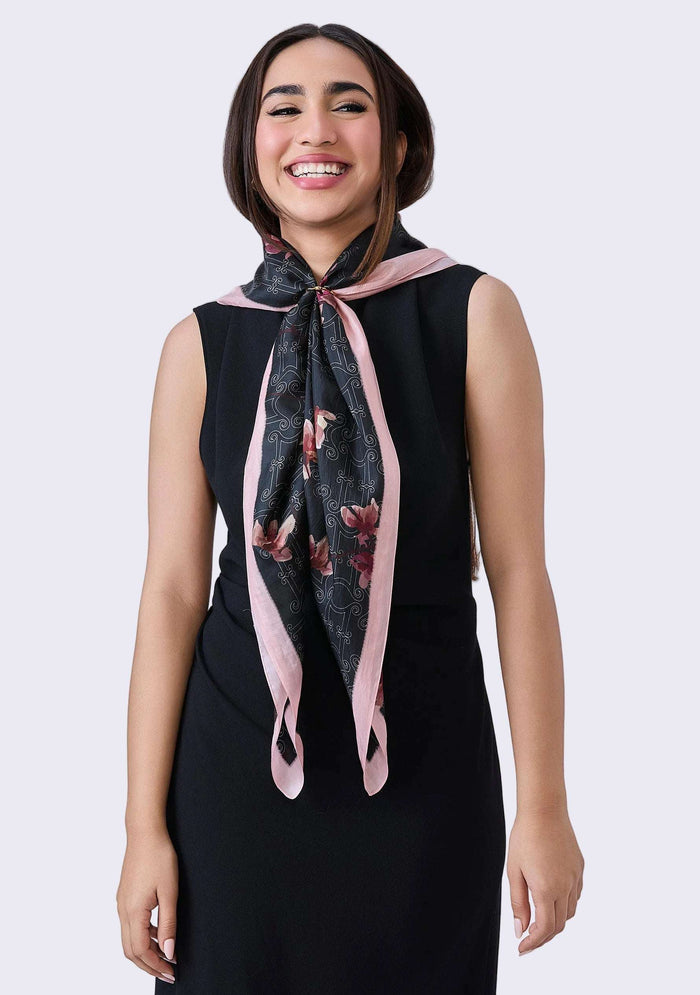 Maneesha Ruia Monogram Orchid Silk Scarf — orchid-inspired monogram print with signature pink border in silk twill