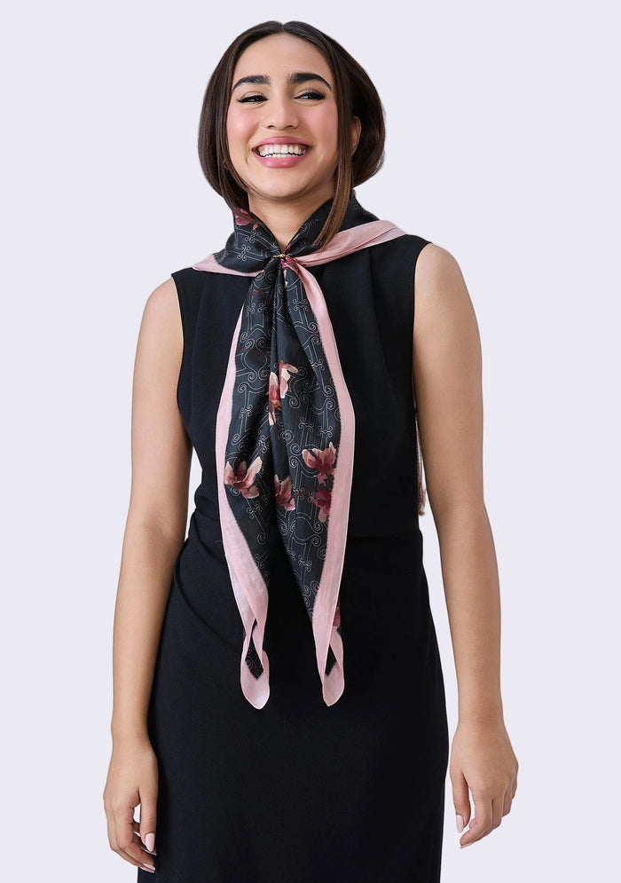 Maneesha Ruia Monogram Orchid Silk Scarf — orchid-inspired monogram print with signature pink border in silk twill