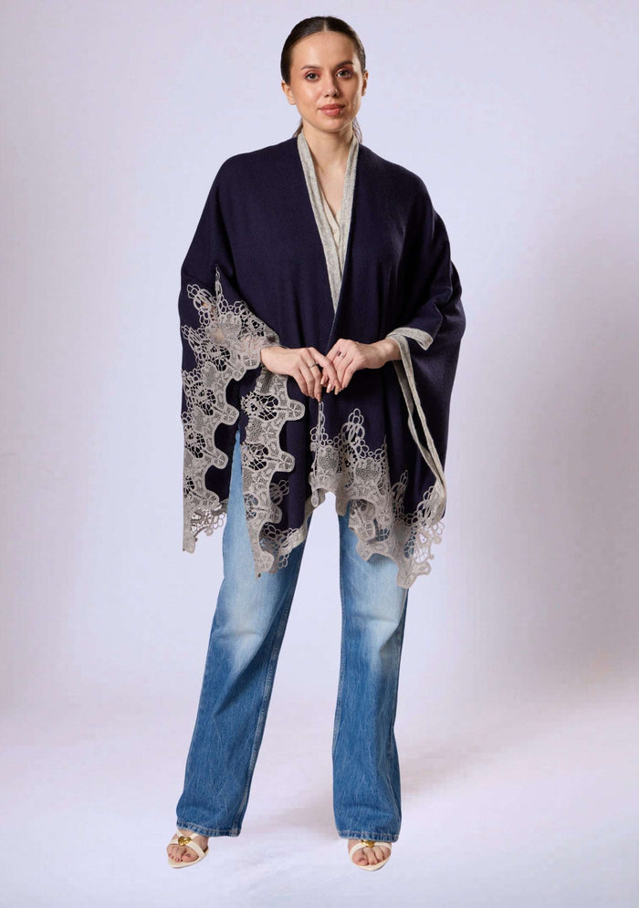 Maneesha Ruia navy blue wool cape with light gray lace styled on female model, elegant winter layer