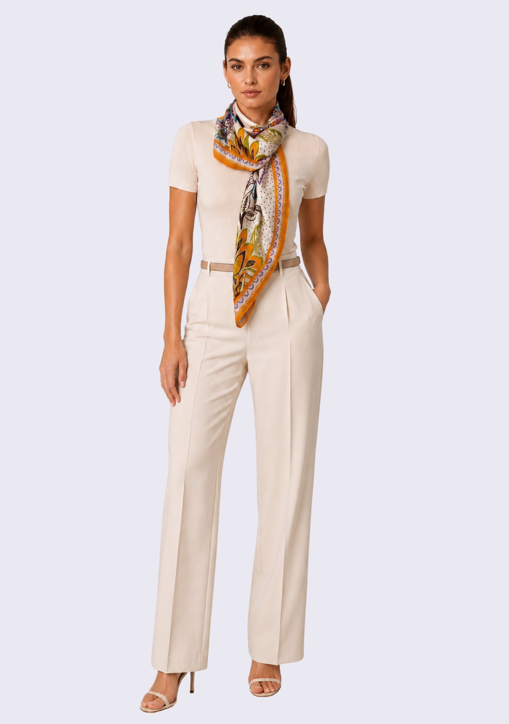 Multi Chintz Print Silk Square Scarf with Lavender Swarovski Crystals styled as a luxury silk neck scarf with an elegant ivory top and tailored trousers.