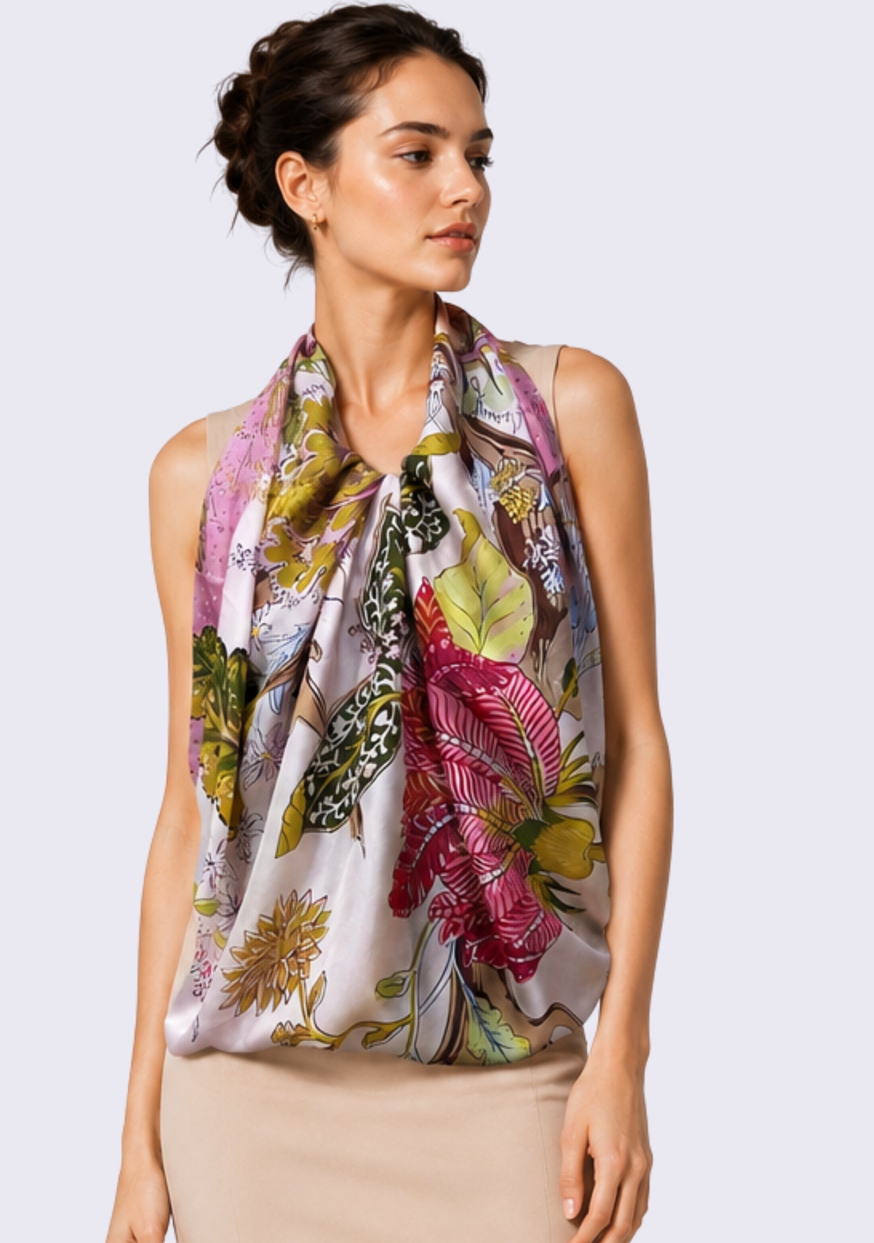 Multi-colored Jacobean Print Silk Scarf with Pink Swarovski Crystals styled as a luxury silk drape with an elegant beige dress.