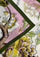 Close-up of the Multi-colored Jacobean Print Silk Scarf with Pink Swarovski Crystals, showcasing the luxurious silk fabric and botanical print details.