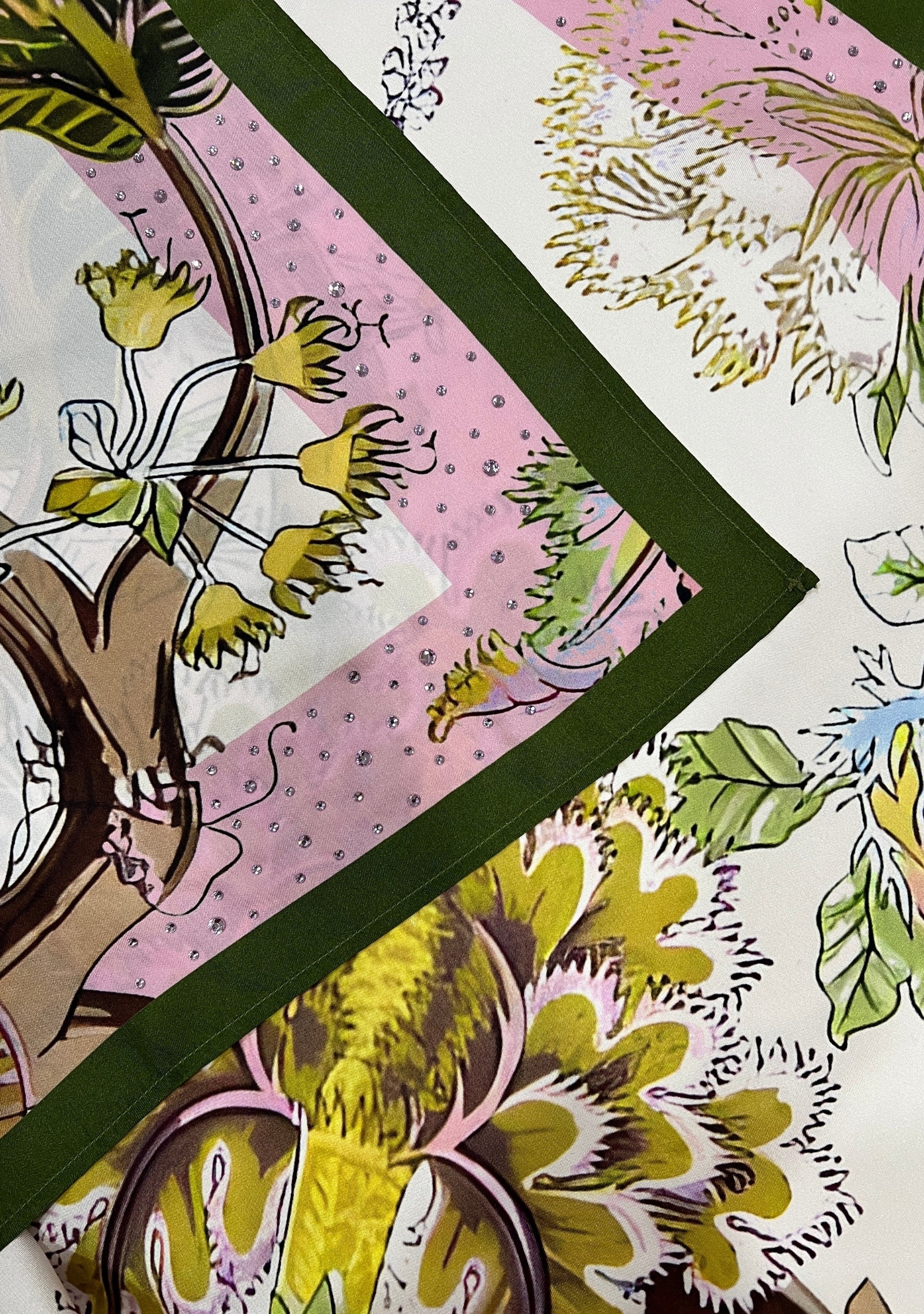 Close-up of the Multi-colored Jacobean Print Silk Scarf with Pink Swarovski Crystals, showcasing the luxurious silk fabric and botanical print details.