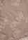 A woman wearing a natural color cashmere scarf with dual shade copper Chantilly lace,