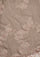 A woman wearing a natural color cashmere scarf with dual shade copper Chantilly lace,