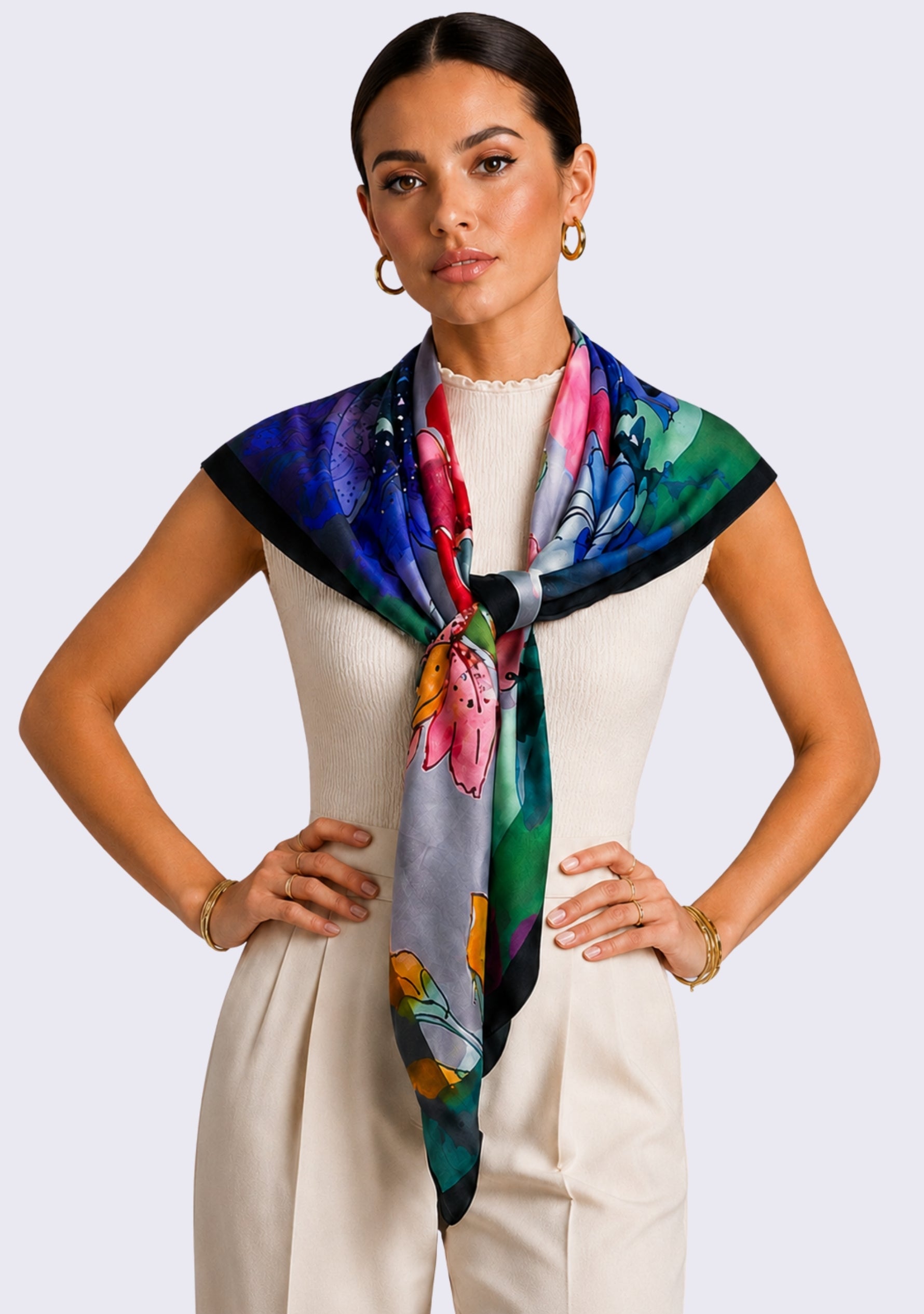 Maneesha Ruia Poppy Field Print Silk Twill Square Scarf with Gunmetal & Silver Swarovski Crystals styled as an elegant silk neck scarf with an ivory sleeveless top and tailored trousers.